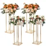 4 stk guld metal søjle blomsterstandere, 80 cm høj med geometrisk vase, perfekt til bryllupper og fester. Elegante midterstykker til receptioner.